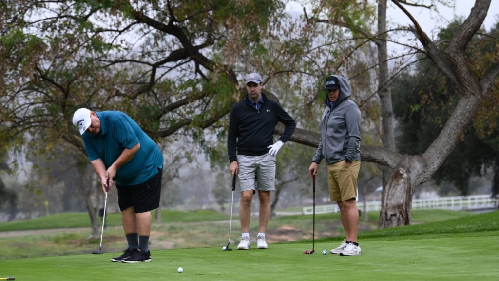 Boys playing Golf