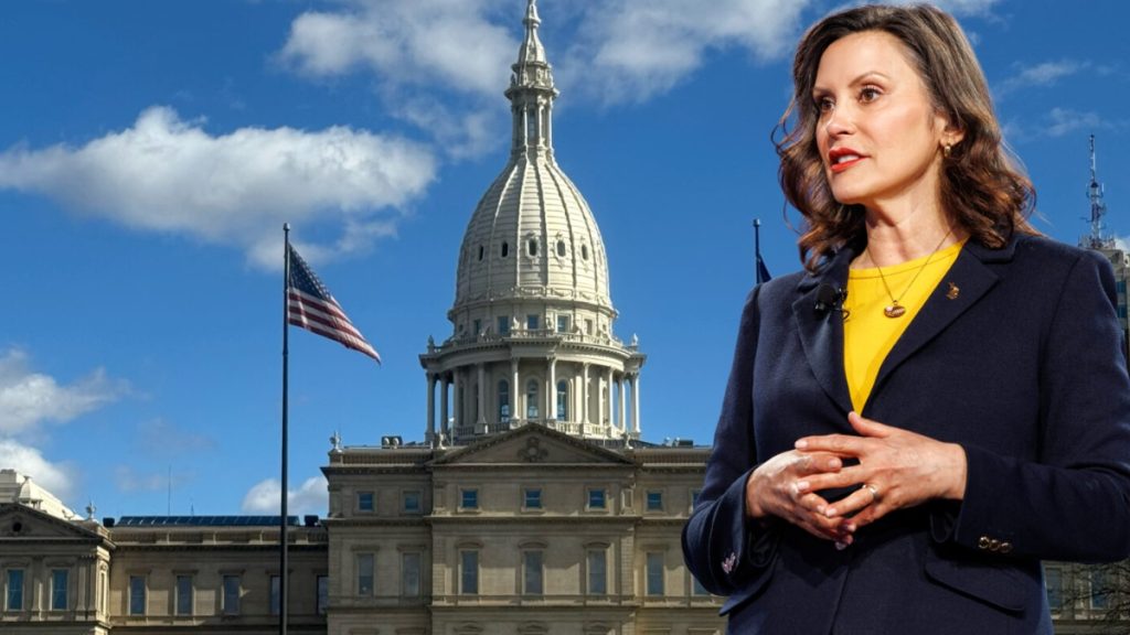 Governor Whitmer stands before the white dome of the Michigan State Capitol with an American flag nearby. This image contextualizes her proposal to implement a per-wager Michigan Sports Betting Tax of 25 to 50 cents per bet to help fund state health programs